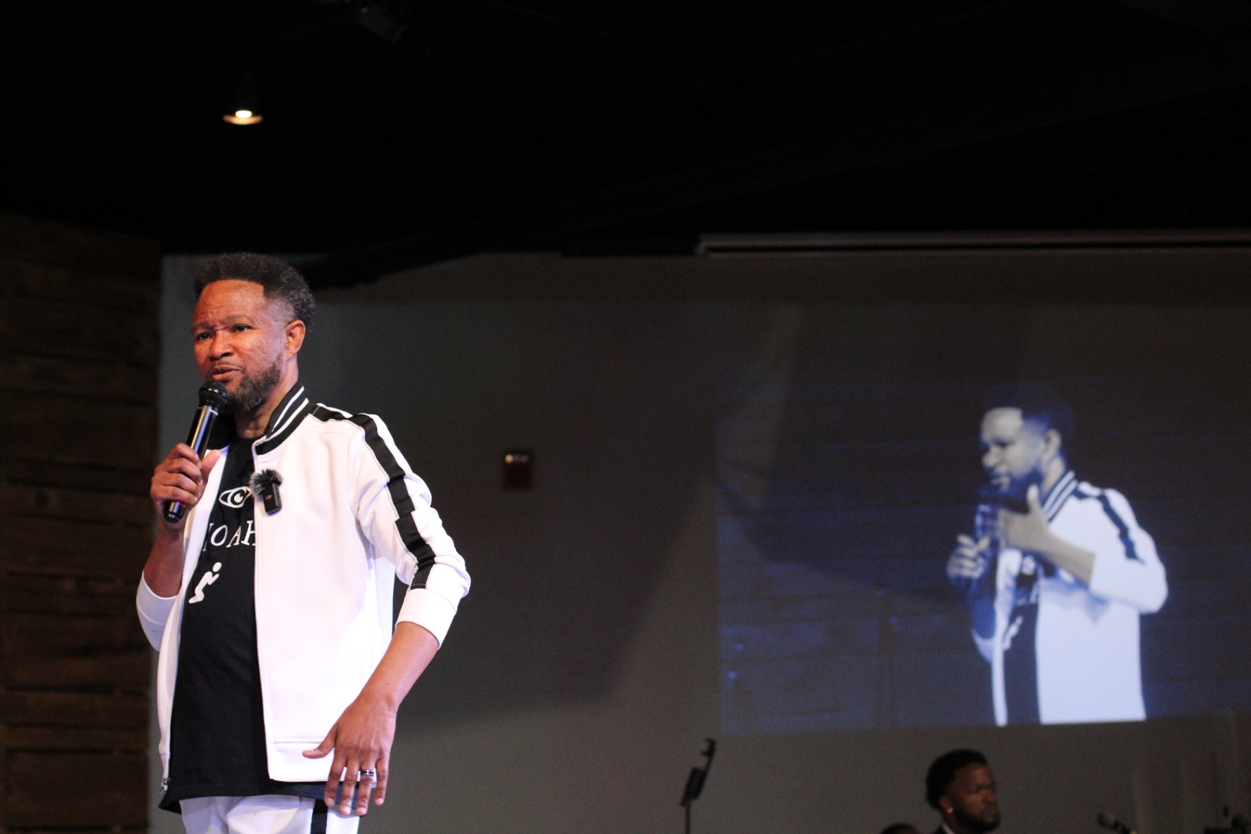 Apostle Craig preaching under the lights