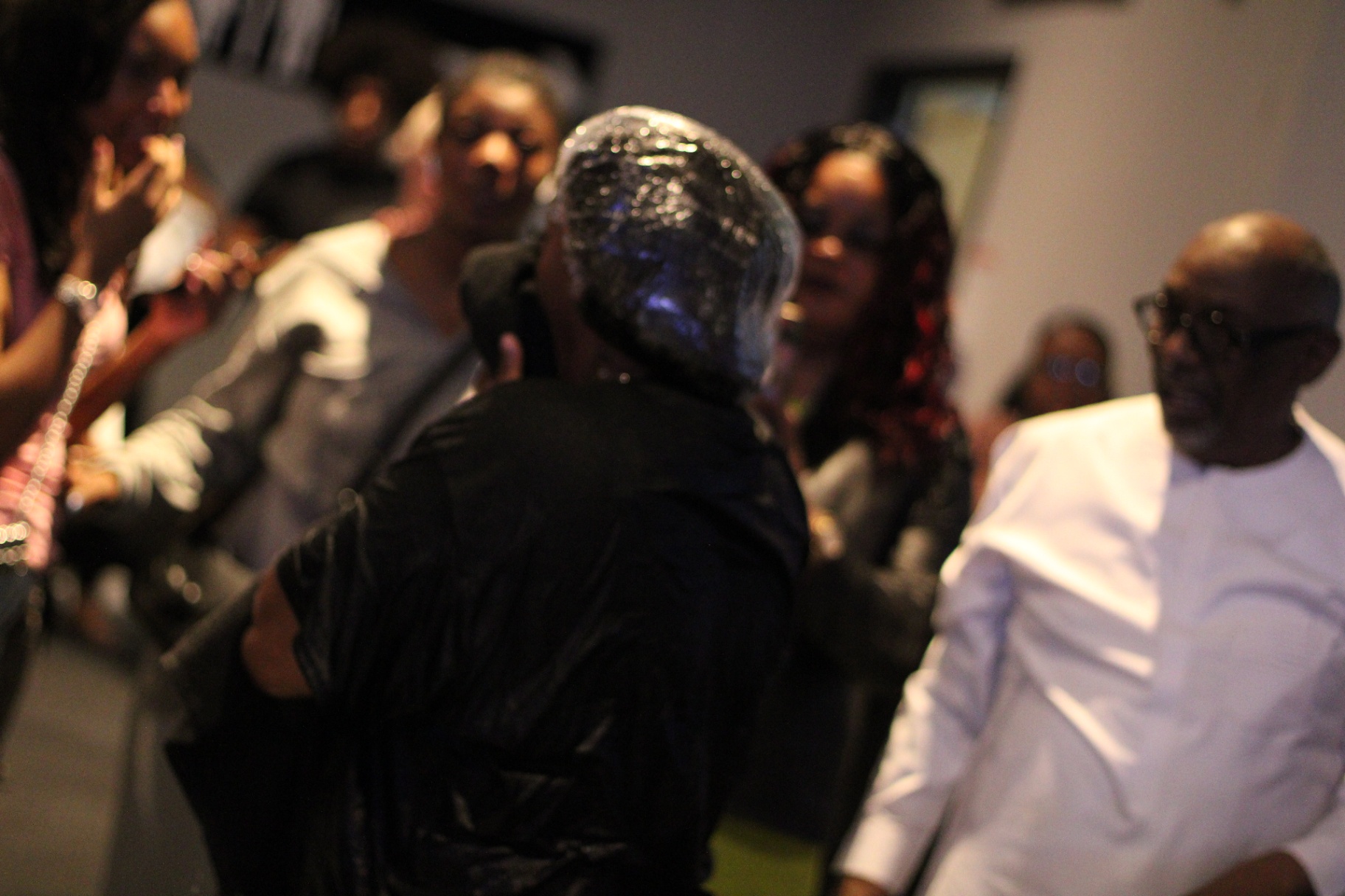 Family and friends celebrate a baptism