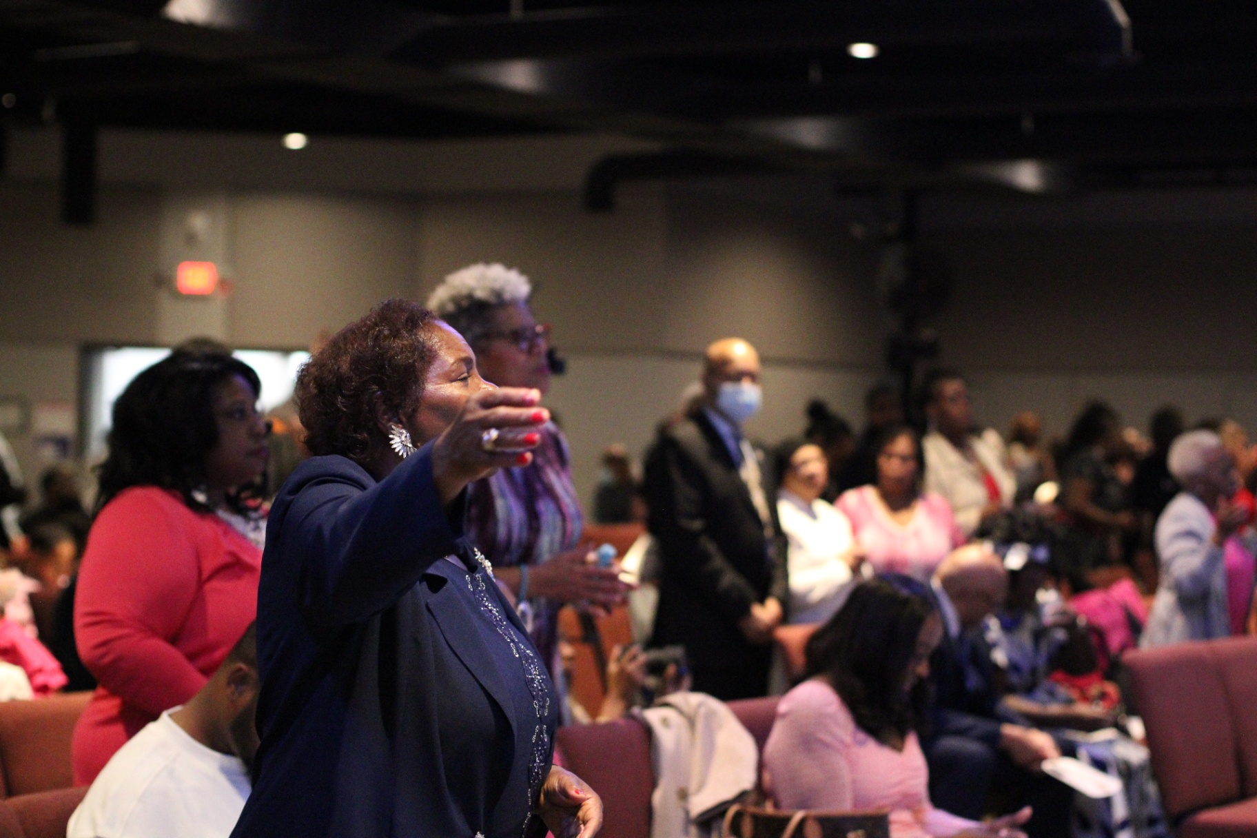 Congregation lifting hands