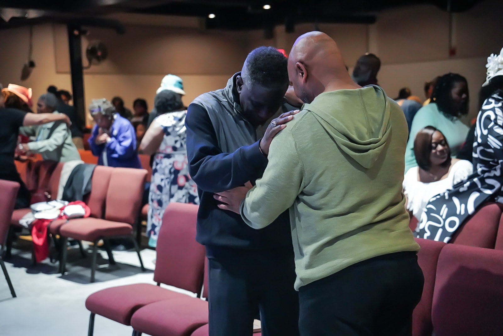 Praying with a brother after service