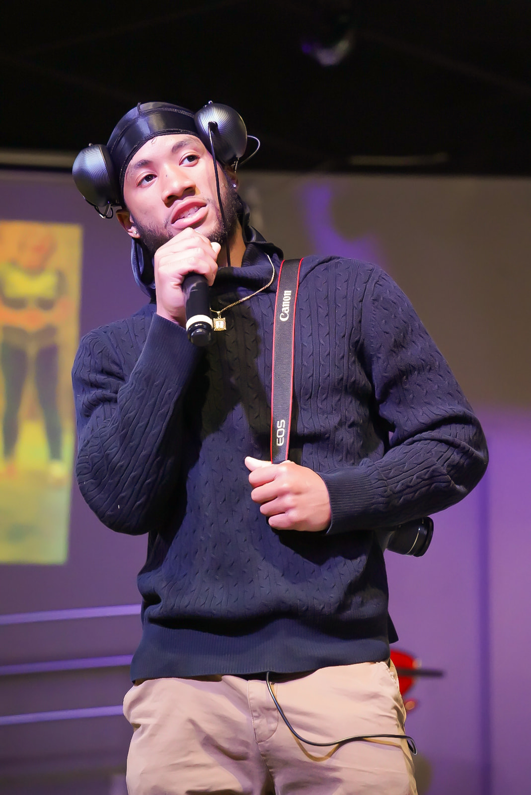 Media team member sharing on stage