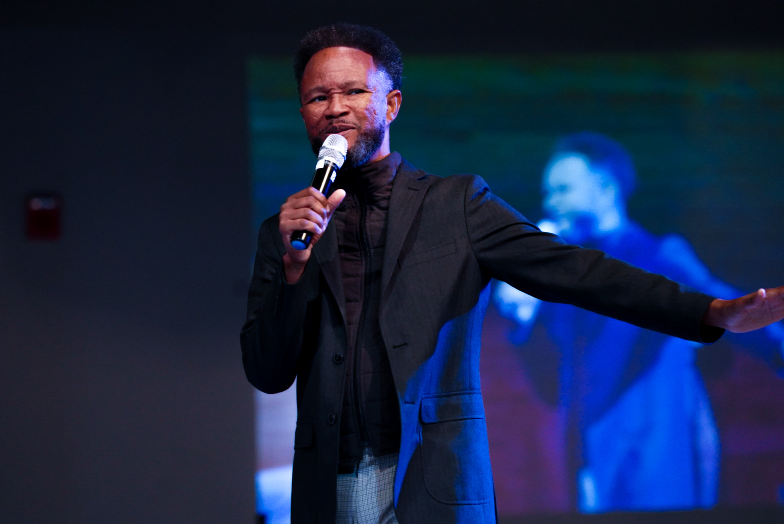 Apostle Craig ministering on stage