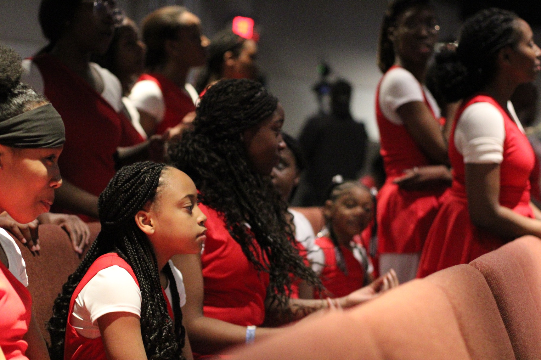 Youth in red gathered together