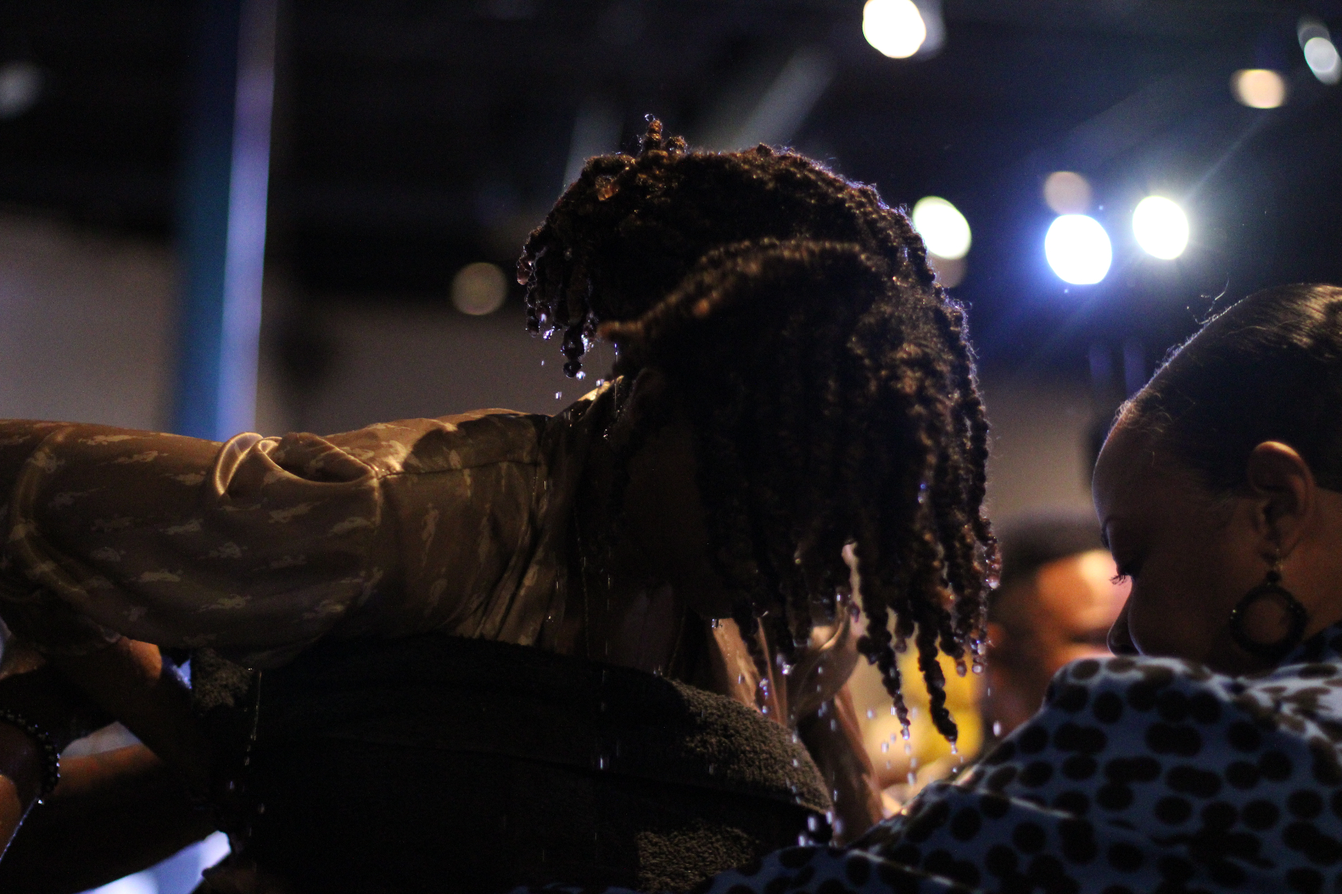 Water pouring after baptism